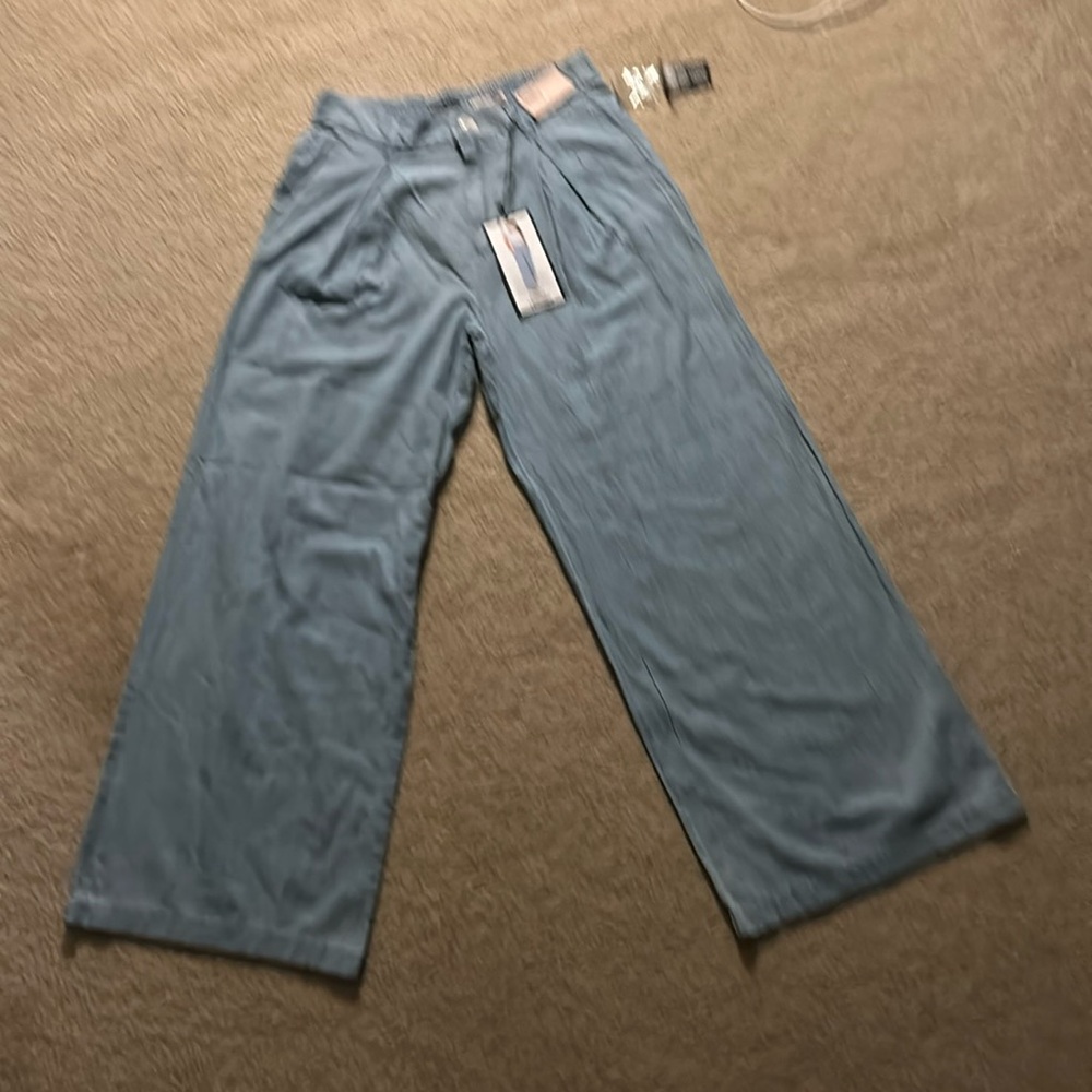 Size medium denim trousers NWT.